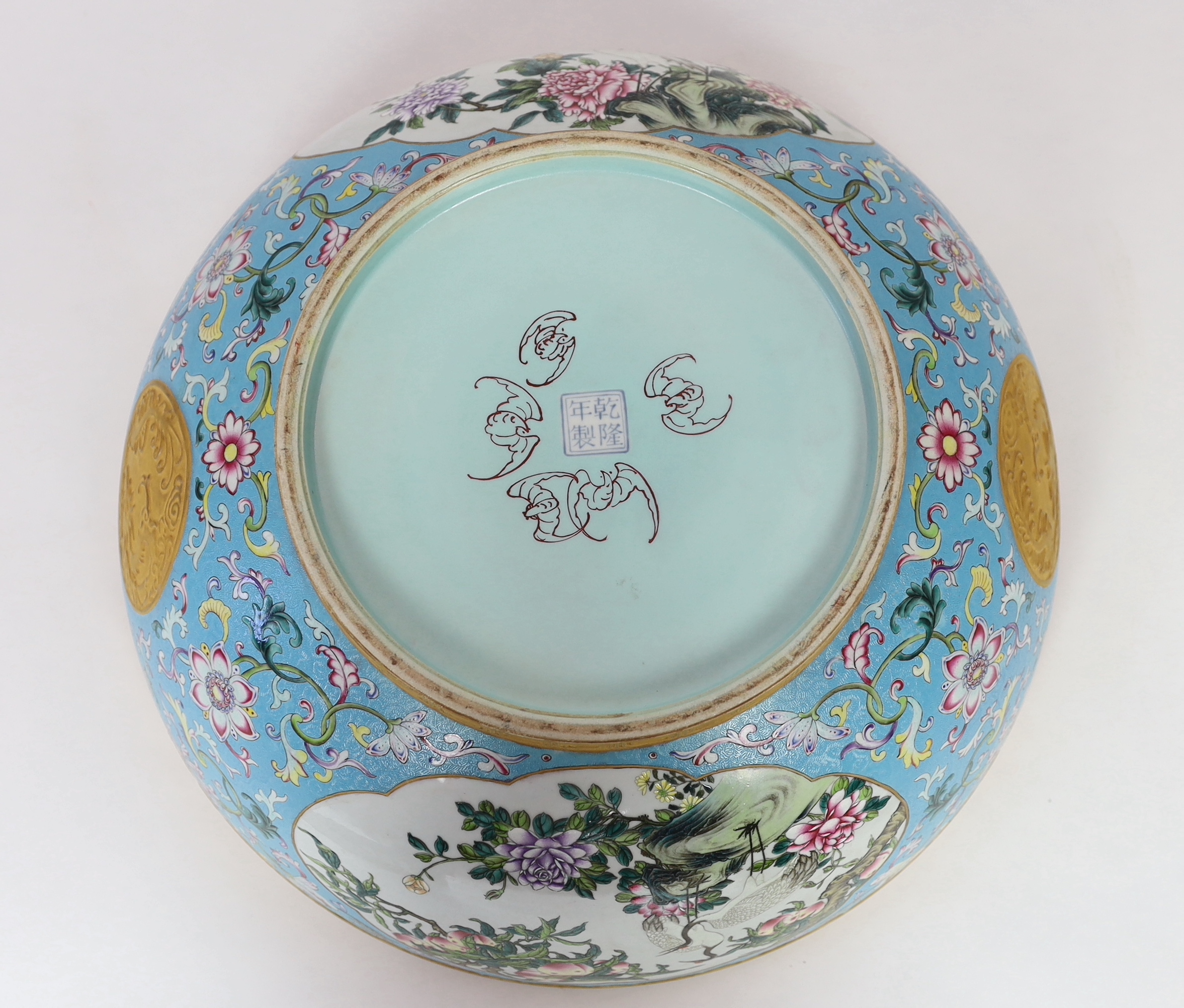 A large Chinese enamelled porcelain fish or punch bowl, Qianlong mark but modern, gilding worn